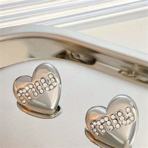 miu miu heart earrings|miu michael's earrings.